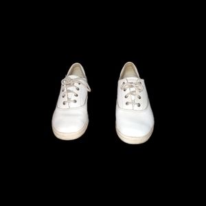 white Keds grasshoppers, woman shoes.